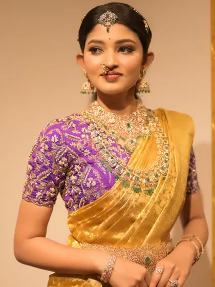 Another angle of this royal ensemble, highlighting the intricate zari work on the blouse.