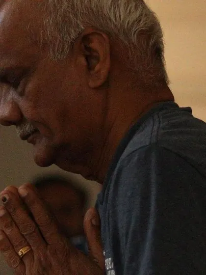 A close-up of a participant in a state of peaceful contemplation. My sessions encourage you to connect with your inner self in a supportive and gentle environment.