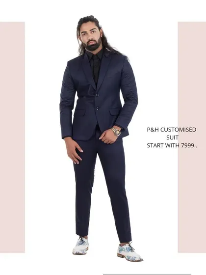 A full-length shot of the navy blue suit, a perfect choice for business or formal events.