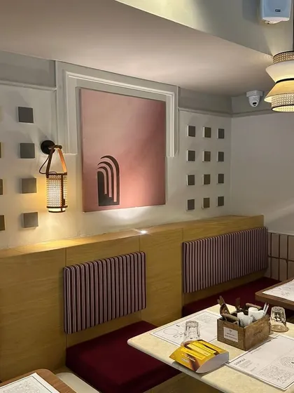 Another artwork for the Agra cafe, this one featuring a minimalist design of receding arches in a dusty rose palette.