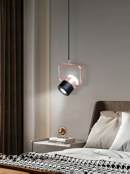 This adjustable spotlight pendant is a great bedside lighting solution. The rose gold finish adds a touch of warmth, and you can direct the light exactly where you need it.
