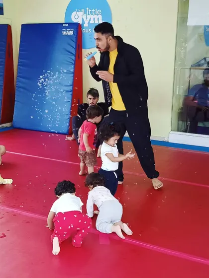 Our little "Birdies" are captivated by bubbles. This simple, fun activity is great for improving their eye-tracking abilities and hand-eye coordination.