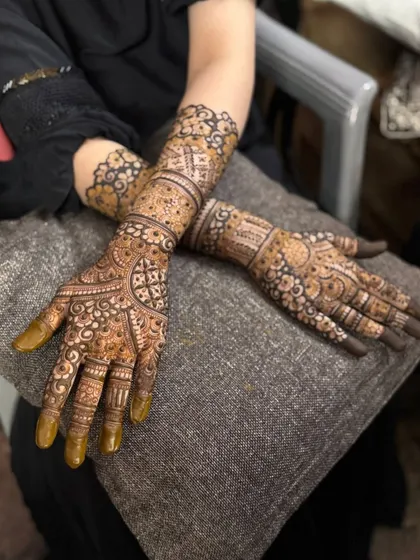 This is a detailed view of my intricate bridal henna work. Each design is unique, combining traditional patterns like paisleys and mandalas with fine-line fillers to create a stunning, full-coverage look for your special day.