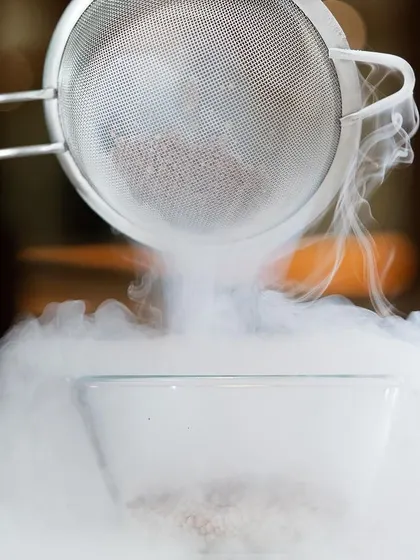 We are always pushing the boundaries of what's possible with chocolate. Here, we're using liquid nitrogen to create unique textures and forms in one of our experimental sessions.