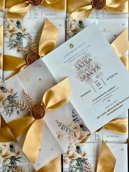 A duplicate image of the opened S&S wedding invitation.