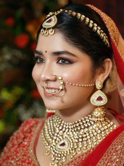 A happy, smiling bride. The makeup is designed to look beautiful from every angle and in every light.