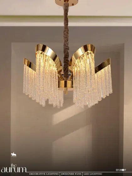 This fixture features curtains of crystal that hang from a polished gold frame, creating a waterfall of light. I often suggest this style for spaces that need a touch of art deco glamour, like a boutique hotel or a chic powder room.