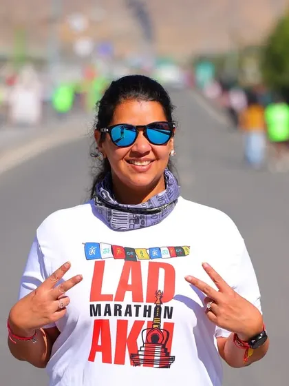 A proud runner showing her support for the Ladakh Marathon. The energy and spirit of the event are a huge part of the experience.