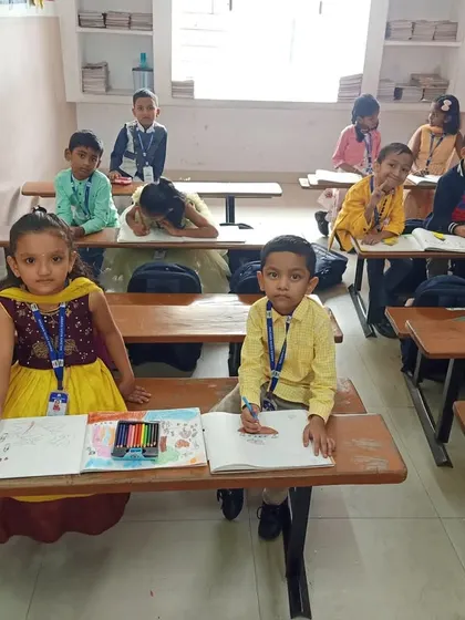 Young participants at our Amara Vidya Niketan competition, ready with their crayons and drawing sheets. It's always a joy to see the excitement on their faces as they begin their artistic journey.