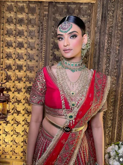 A close-up of the regal red bridal look. Master this signature style by joining my upcoming Delhi course.