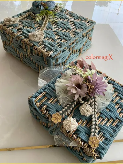 A pair of our blue jute hampers, perfect for wedding return gifts or festive giveaways. The consistent design ensures a professional and elegant presentation.