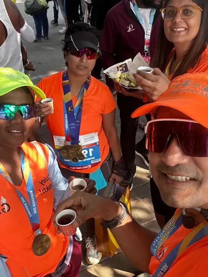 Post-race chai with the tribe. The small moments of celebration are just as important as the race itself.