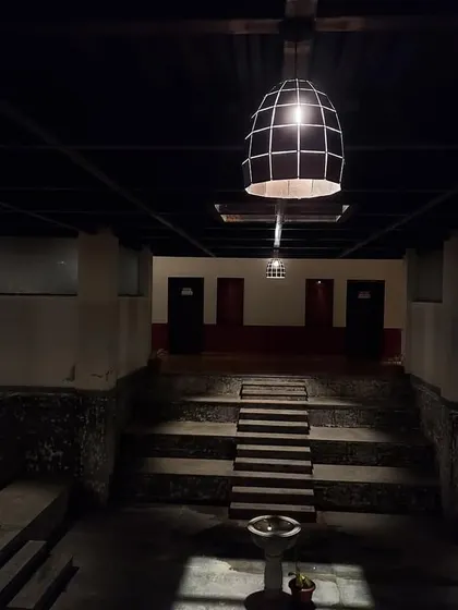 The quiet ambiance of our central courtyard at night. The minimalist lighting and traditional architecture create a space that feels both sacred and serene.
