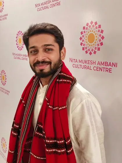 At the Nita Mukesh Ambani Cultural Centre for a concert. This image, where I am dressed in a traditional kurta and shawl, is great for event-based promotions or collaborations with cultural institutions.