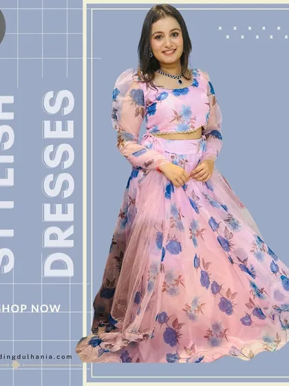 A beautiful organza lehenga with a pink and blue floral print. This is a light and airy option, perfect for a summer wedding event.