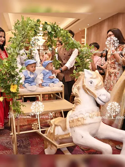 A precious moment from the twins' first birthday, showing them in a beautifully decorated horse-drawn cart for a memorable entrance.