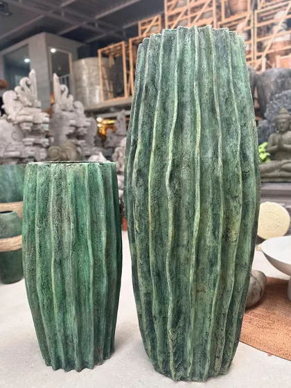 The 'Luis' planter with its regal finish, seen here in my workshop among other beautiful pieces.