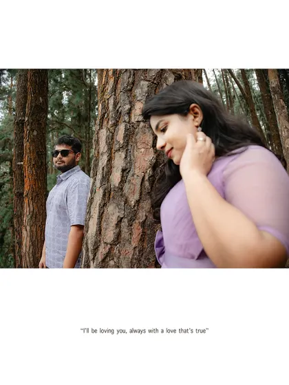 A thoughtful and artistic portrait of a couple in a pine forest.