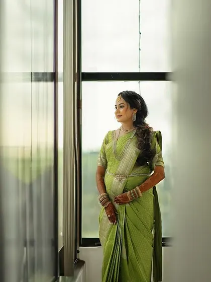 A bride looking out a window, lost in thought. I love these quiet, in-between moments that are so full of emotion and anticipation.