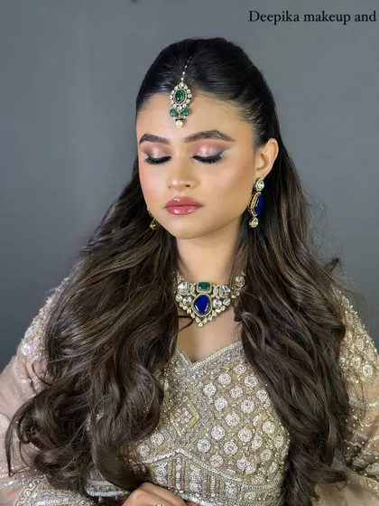 Another angle of the North Indian bridal look, with eyes closed to showcase the flawless eyeshadow blending and long lashes.