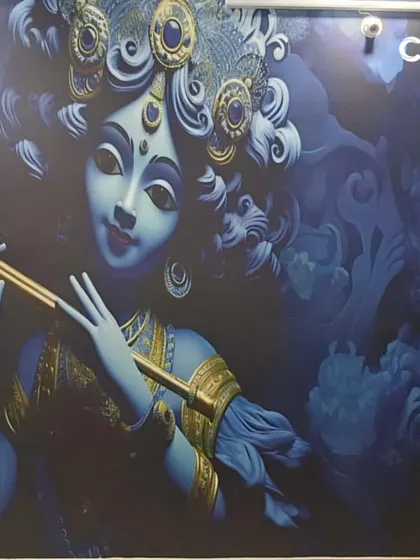 This stunning, large-scale Krishna wallpaper was custom designed and installed to create a powerful spiritual and artistic focal point in the room. We can turn any high-resolution image or theme into a personalized wallpaper for your home.