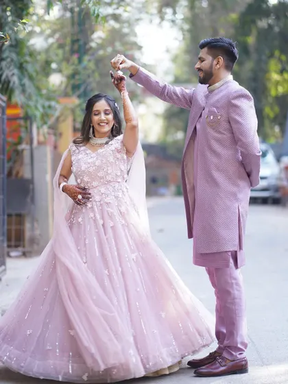 A lovely couple moment featuring our pastel pink gown. The floral applique work on the gown gives it a romantic, fairytale feel, perfect for an engagement shoot.