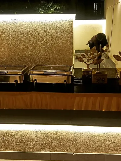 A stylish buffet arrangement for a house party of 40, perfectly integrated with the home's modern decor.