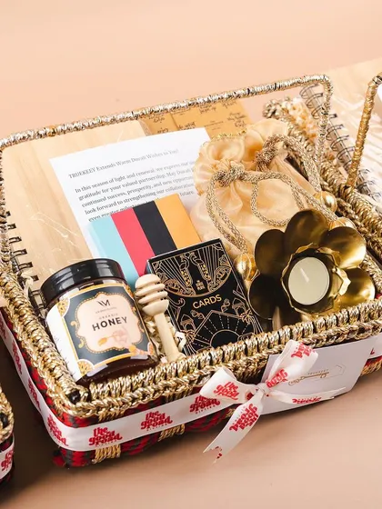A beautiful assortment of our Diwali hampers, showcasing different styles and packaging options. From woven baskets to custom boxes, we have something for every taste and budget.