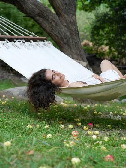 Another angle of pure relaxation in the hammock. Allowing the body to completely rest and be held by nature is deeply restorative.