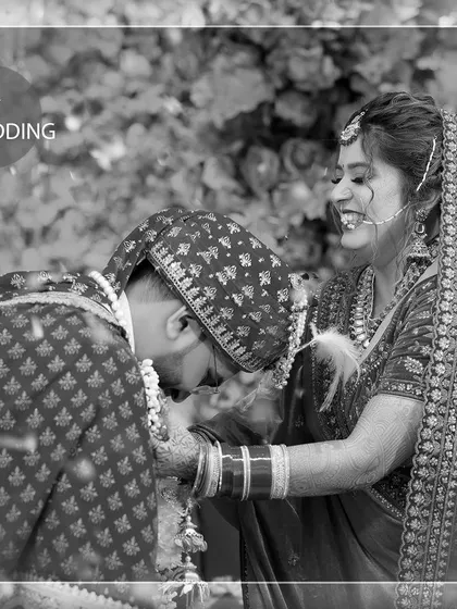 The happiness and prosperity of their melodious love is all over this picture. A black and white shot of a playful moment during the jaimala.