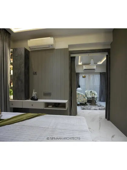 A view from the master bedroom into a private formal seating area in the Duplex Project. This design creates a personal suite for relaxation and privacy.