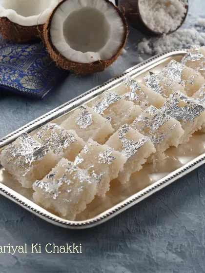 Love at first bite. Our Nariyal Ki Chakki is a classic Indian sweet made with fresh coconut, sugar, and garnished with silver vark for a melt-in-your-mouth experience.