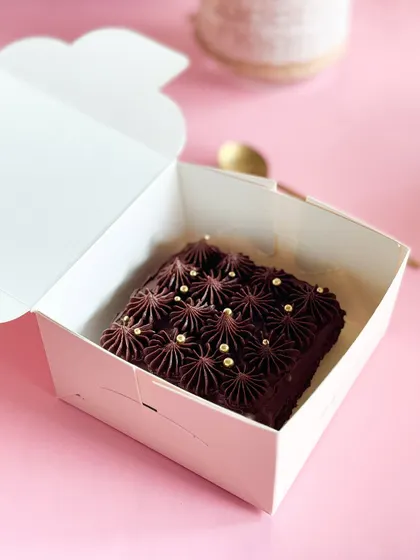 Indulge in petite perfection. This mini brownie dessert is perfect for a small celebration or as a sweet add-on to any gift hamper.