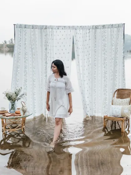 A truly dreamy and surreal setup. Our sheer curtains, with their delicate floral patterns, stand against the water, showcasing their light and airy quality in the most beautiful way.