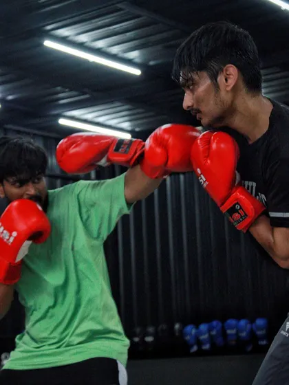 An exchange of punches during a sparring drill. This is how you learn to handle pressure and keep your form from breaking down.