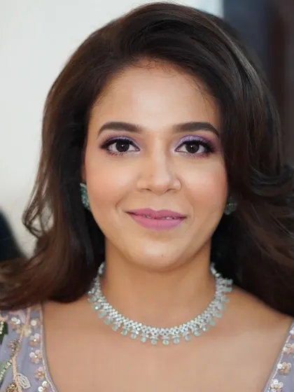 A lovely portrait of Nilofar, showcasing her elegant engagement makeup. The look is balanced and polished, allowing her natural beauty to be the focus.