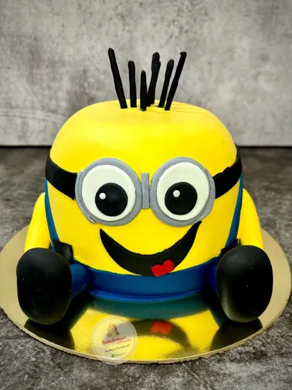 A slightly different angle of the Minion cake, showing off his full, rounded shape and spiky hair. This one was a delicious banana chocolate truffle flavour.