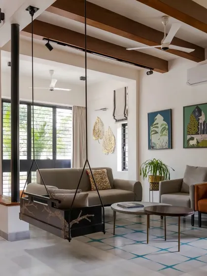 For this Hyderabad residence, we collaborated on an interior that feels both contemporary and grounded. The custom swing, patterned floor tiles, and natural textures come together to create a sophisticated living space that proves sustainable design can be elegant and modern.