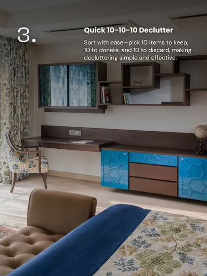 Our blog on decluttering highlights the "10-10-10" method. This image of a well-organized study area shows how keeping surfaces clear allows the custom blue and wood credenza to become a beautiful and functional focal point.