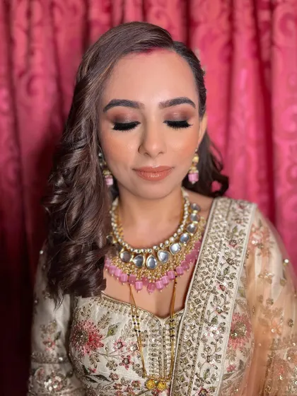 A close-up of the eye makeup, showing the beautiful blend of bronze and brown tones for a sultry effect.