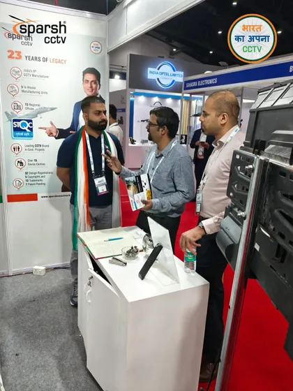 My team member, wearing the Indian tricolor, in a detailed conversation with industry experts at SES 2025. My pride in my Indian roots is reflected in everything I do.