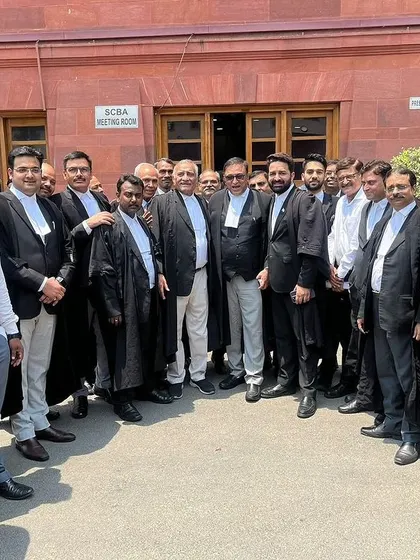 A group photo showing our collective support for our senior during the SCBA election campaign. Teamwork extends beyond the courtroom into our professional community activities.