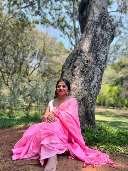 The sunlight and the pink saree made for a perfect picture.