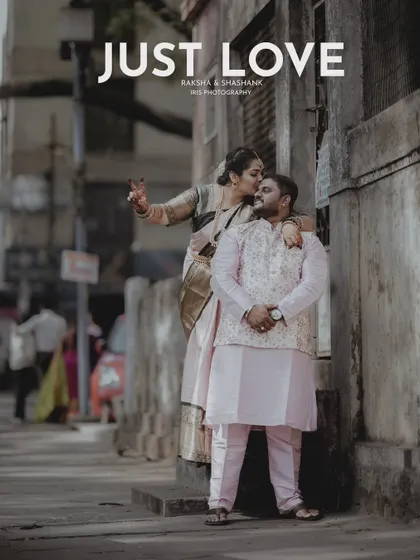 "Just Love." A candid moment from an urban engagement shoot, where the bride kisses the groom's forehead. It’s a perfect example of capturing unscripted affection.