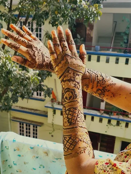 A lovely shot of a bridal design in the sunlight, highlighting the clean lines and balanced composition of the artwork.