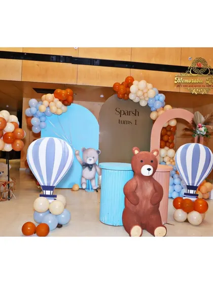 Another view of the teddy bear and hot air balloon setup, showing the cute props and custom backdrops.