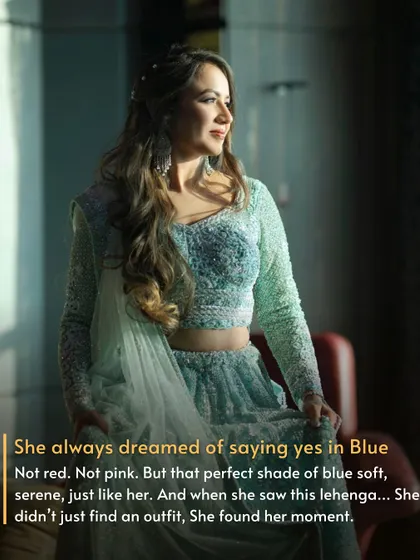 A Dream in Blue. She always dreamed of saying 'yes' in a serene blue lehenga, not the traditional red or pink. She found her perfect moment in this stunning outfit.