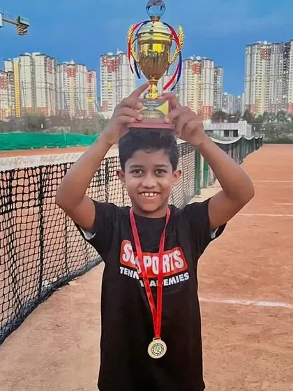 Anshu Prasanna, our Boys U8 Open Tennis Champion. The joy of a first big win is a precious moment we love to celebrate.