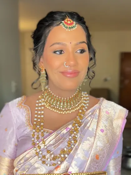 A happy smile from my client. It gives me so much khushi to see someone feel confident and beautiful after I have draped their saree.