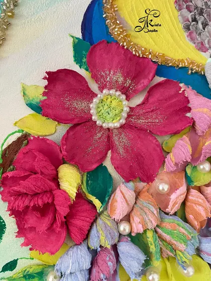 A close-up of the peacock's tail, showing the tiny, individual petals that make up its feathers. I also added pearl details to give it an extra touch of elegance.
